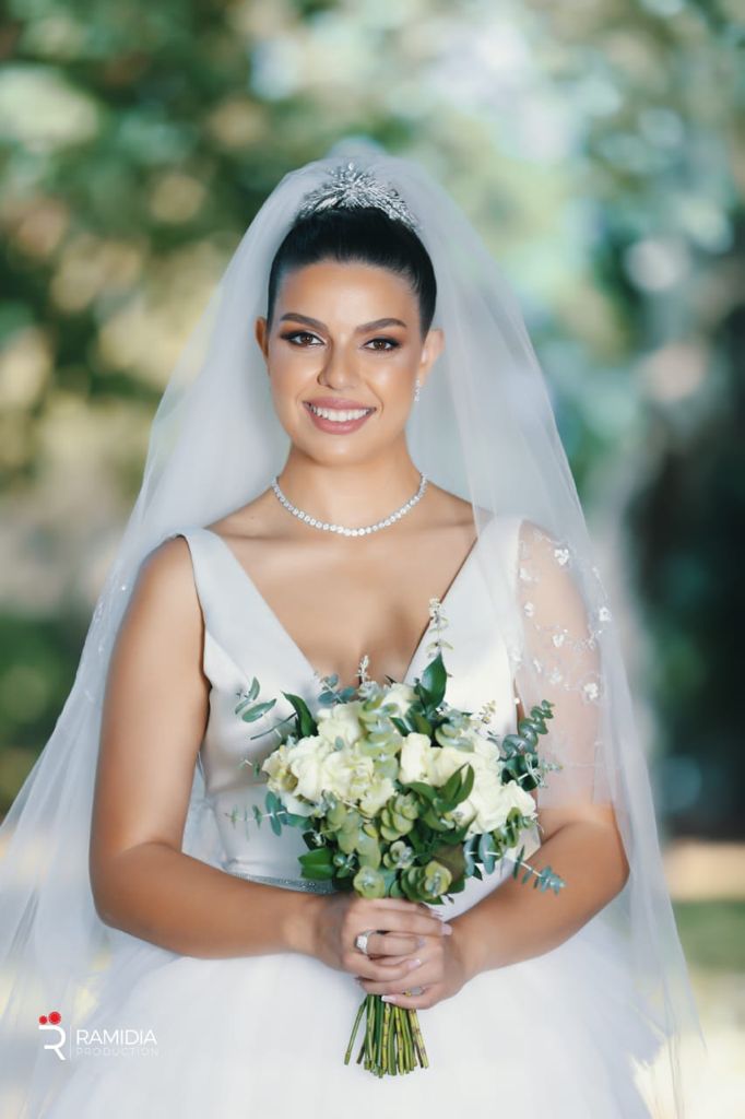 bride wearing diamond necklace