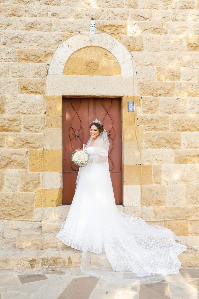 bride next to old house