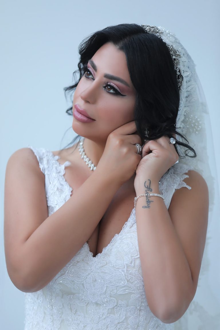 bride wearing her jewelry