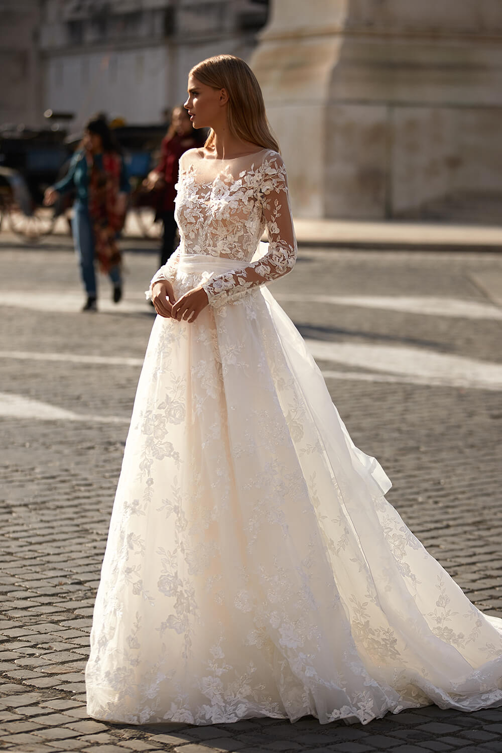 Ivory gown with illusion sleeves