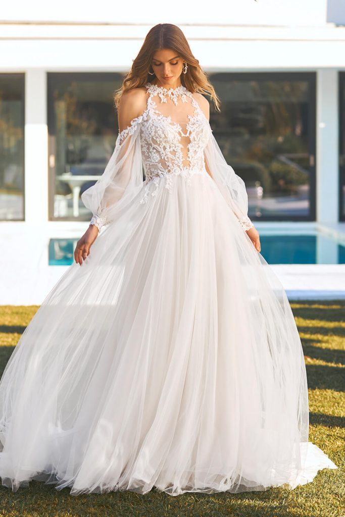A line bridal gown with off the shoulder sleeves