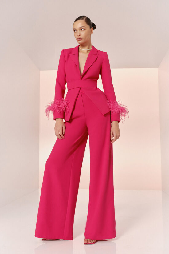 fuchsia suit with feathers