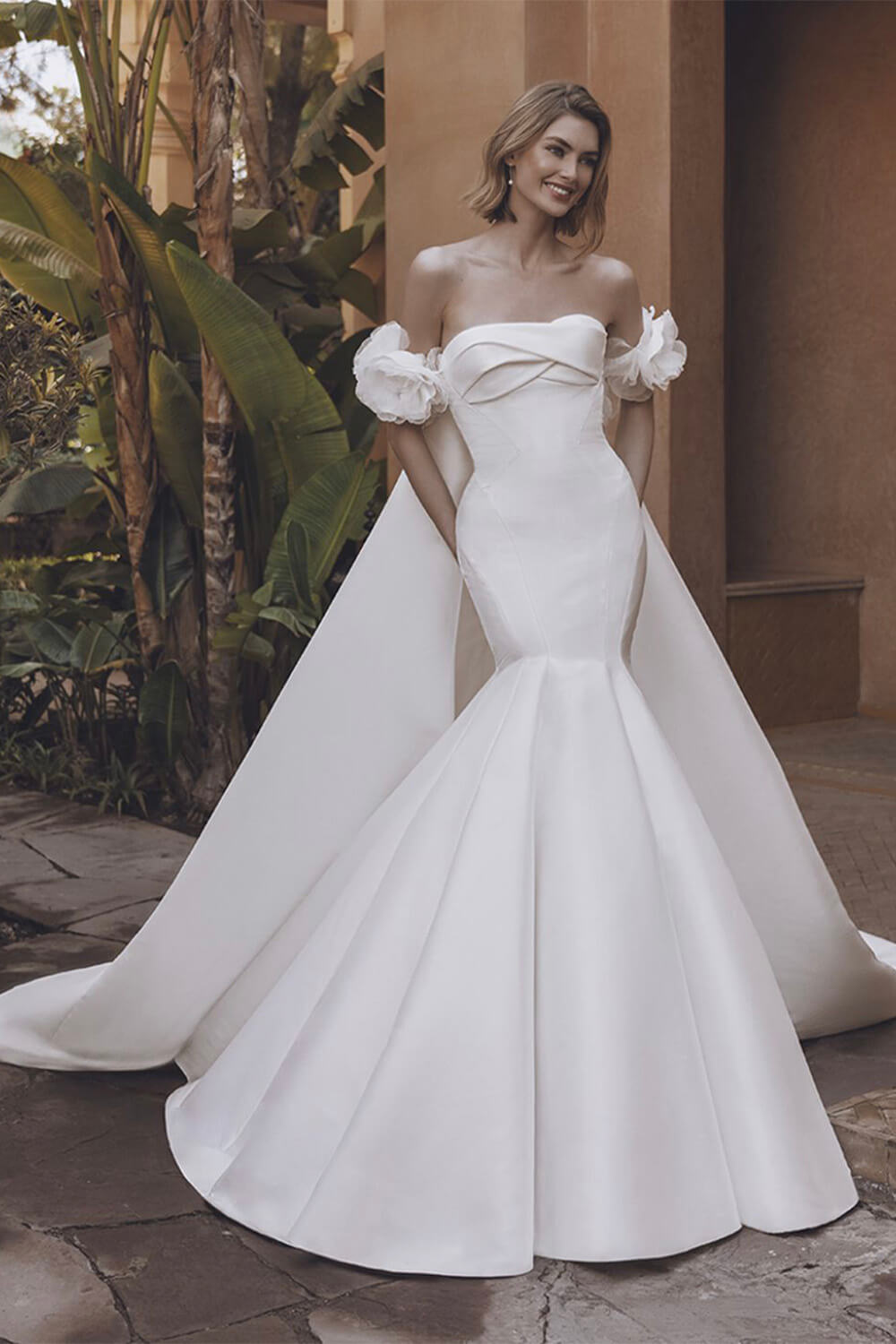 Elegant mermaid wedding dress with a cape